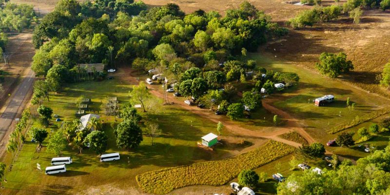aerial shot of caravans dotting the verdant greenery at Litchfield Tourist Park in Darwin