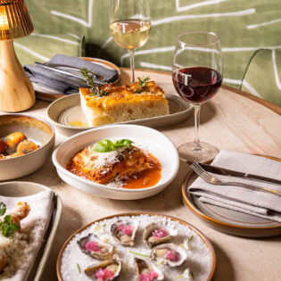 table full of dishes at Folk Lounge & Dining at Tradies Gymea