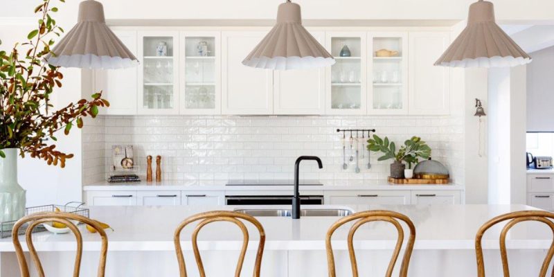 a modern kitchen interior with wooden chairs at Bridgewater