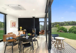 the interior of Espira Airbnb in Adelaide Hills with floor-to-ceiling windows