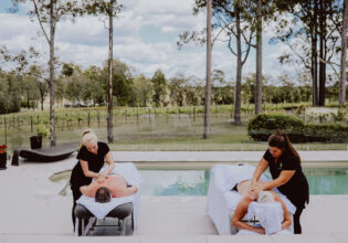 two people undergoing massage treatments by the pool at Nu Leaf Retreat, Hunter Valley