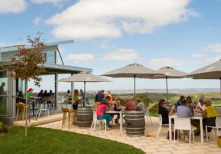 al fresco dining under umbrellas at Pike and Joyce, Lenswood