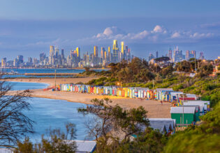 an aerial view of the distant CBD skyline from Brighton Beach