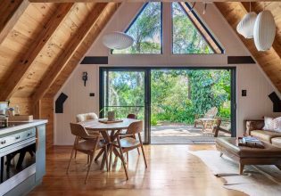 a look inside an A-frame log cabin at Eh Frame, Noosa National Park