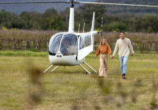 a couple enjoys a helicopter flight over the Hunter Valley with Hunter Valley Helicopters, Pokolbin, Hunter Valley