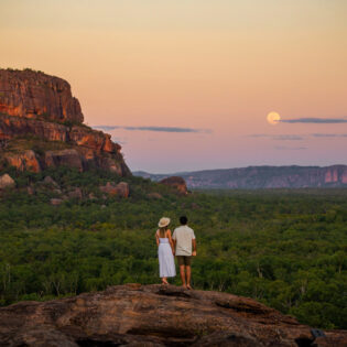 a couple admiring the scenic landscape from Nawurlandja lookout