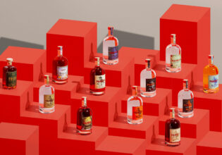gins and spirits on red blocks at Parrot Distilling Co.