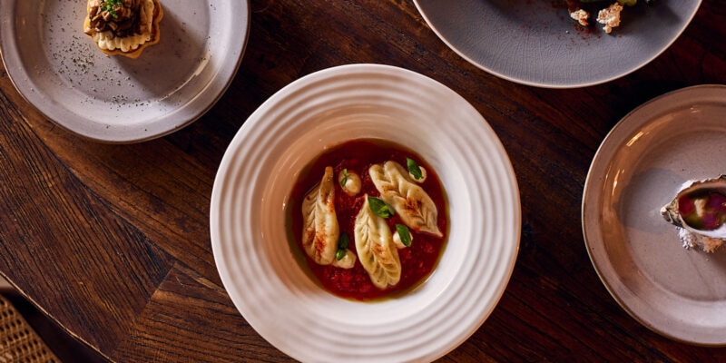 plates of food on the table at at Pilloni, Brisbane