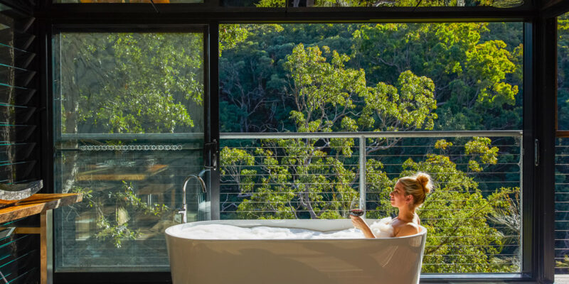 a woman dipping in the tub at Spicers Sangoma, Bowen Mountain