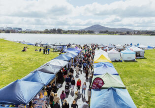people shopping at the market stalls by the lake, The Little Burley Market, Canberra