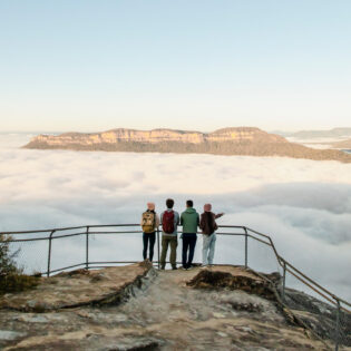 hikers overlooking the Olympian Rock Lookout, Blue Mountains National Park