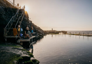 People swimming at the Bogey Hole Newcastle