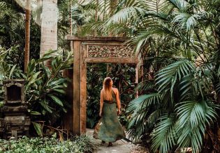 a woman entering the 3. Ikatan Day Spa