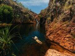 a girl swimming in Maguk in Kakadu