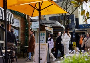 People shopping in the main street of Leura