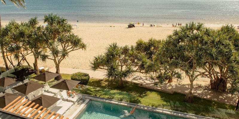 a beachfront swimming pool at Netanya Noosa