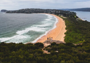 Women at the Palm Beach Lighthouse trail summit looking out over the views