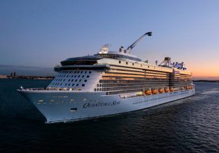 The Royal Caribbean Quantum of the Seas navigating the sea at dusk
