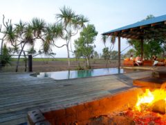 Firepit and infinity pool Bamurru Plains Lodge